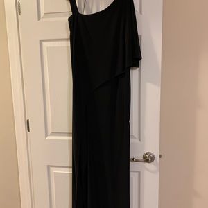 One piece jumpsuit/ looks like a gown, simple n elegant.  Worn once